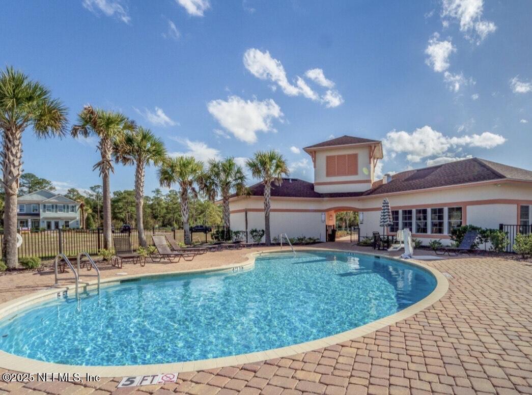 4068 Great Falls Loop Middleburg, FL 32068 - Photo 34 of 36 a view of a house with a swimming pool
