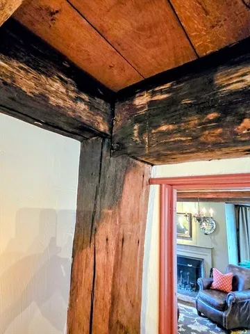 a view of room with furniture and a window