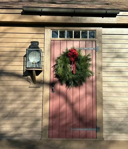 a view of potted plant in front of a door