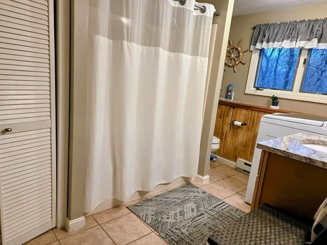 a view of a storage and utility room