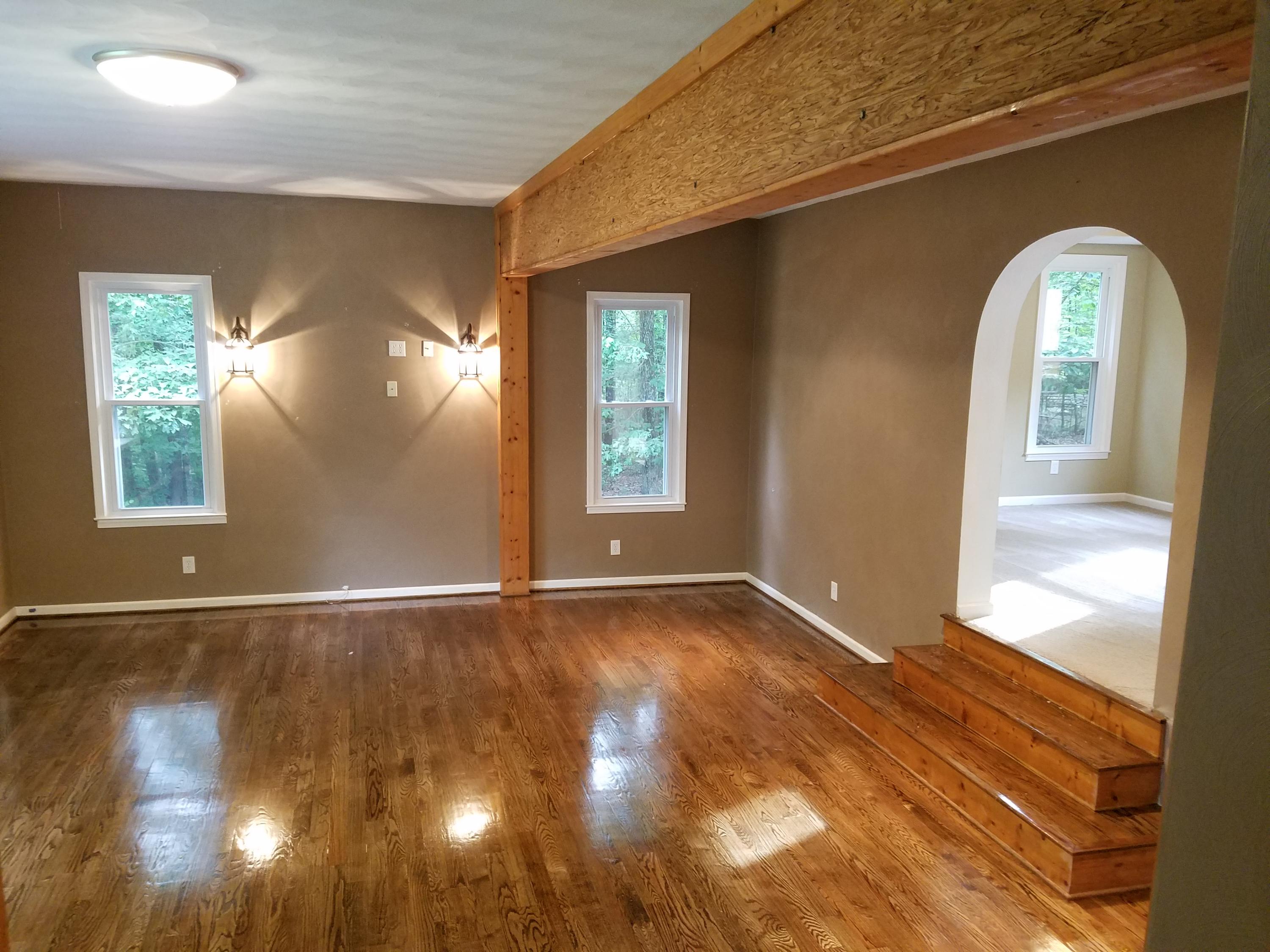 32 Charlie Road Hardy, VA 24101 - Photo 8 of 23 a view of empty room with wooden floor and fan