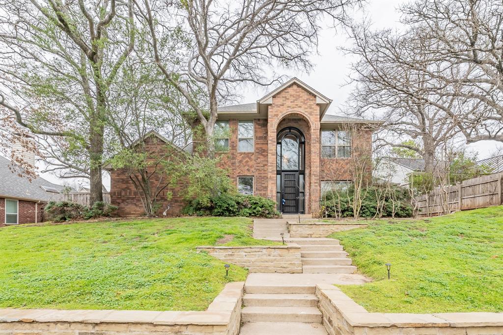 3048 Creekview Drive Grapevine, TX 76051 - Photo 1 of 1 a front view of a house with garden