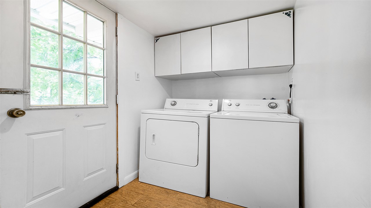 2436 South Ridge Road Oregon, IL 61061 - Photo 9 of 33 a utility room with dryer and washer