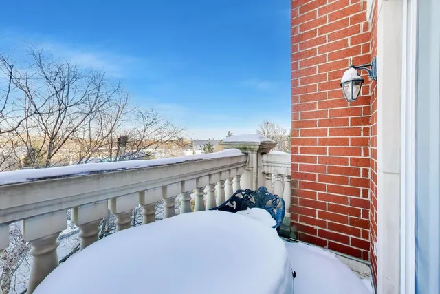 a view of balcony with two chairs