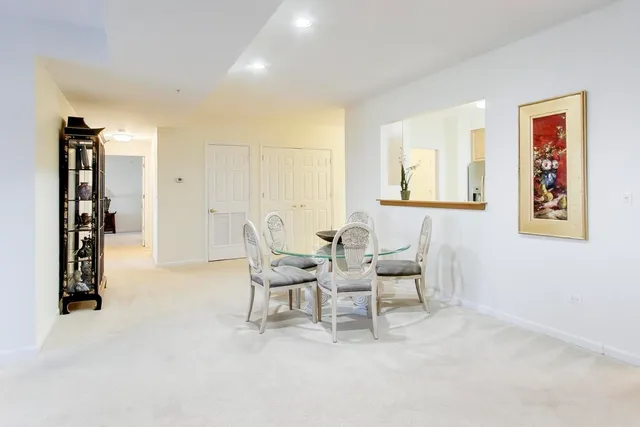 a living room with furniture and closet