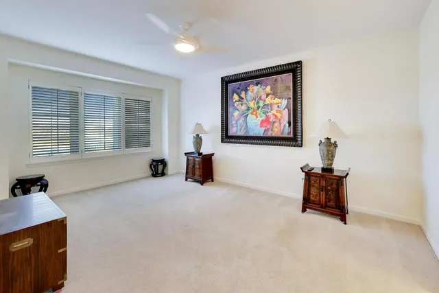 a bedroom with furniture and windows