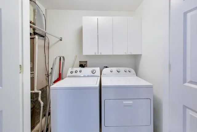 a bathroom with a sink a mirror and a shower