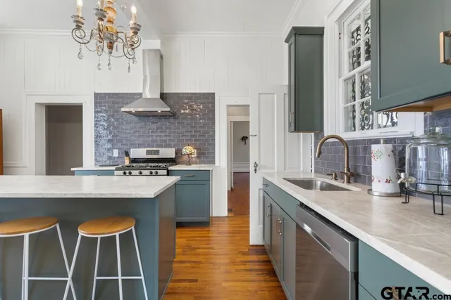 a bedroom with a bed and a fireplace