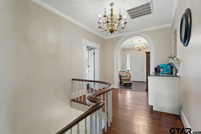 a bed room with a bed and a television