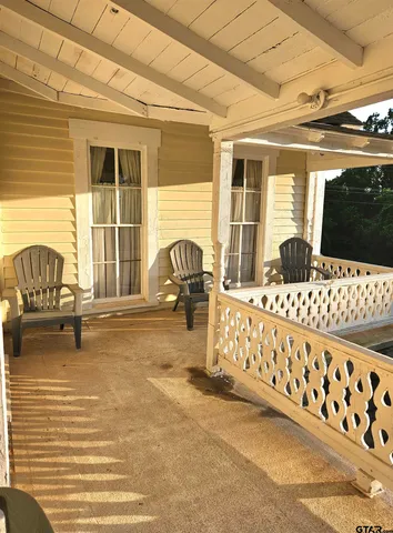 a front view of a house with balcony