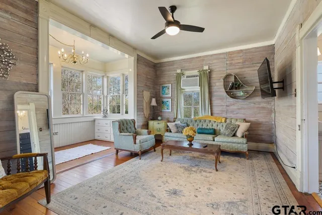 a bathroom with a sink toilet and a mirror