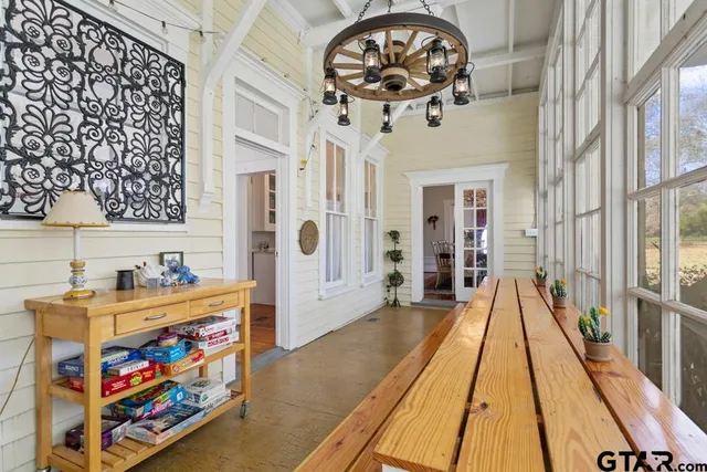 a front view of a house with a big yard