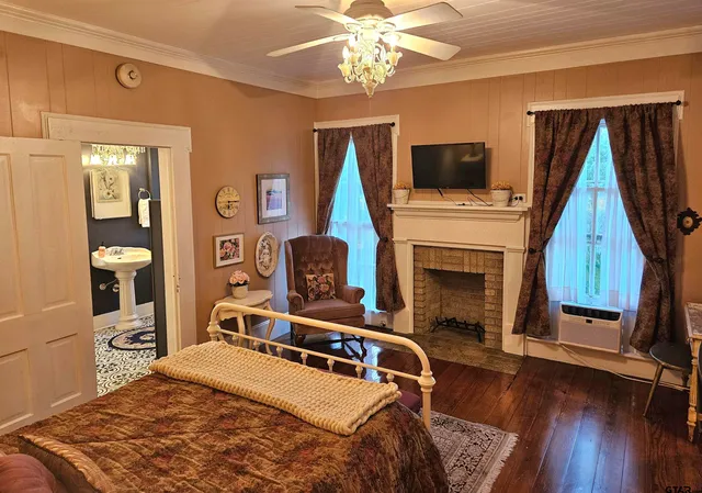 a room with furniture fireplace and flat screen tv