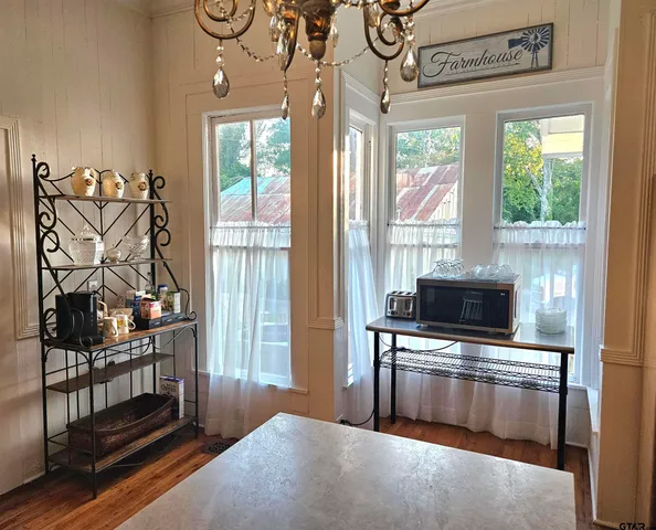 a kitchen with stainless steel appliances a stove and a refrigerator