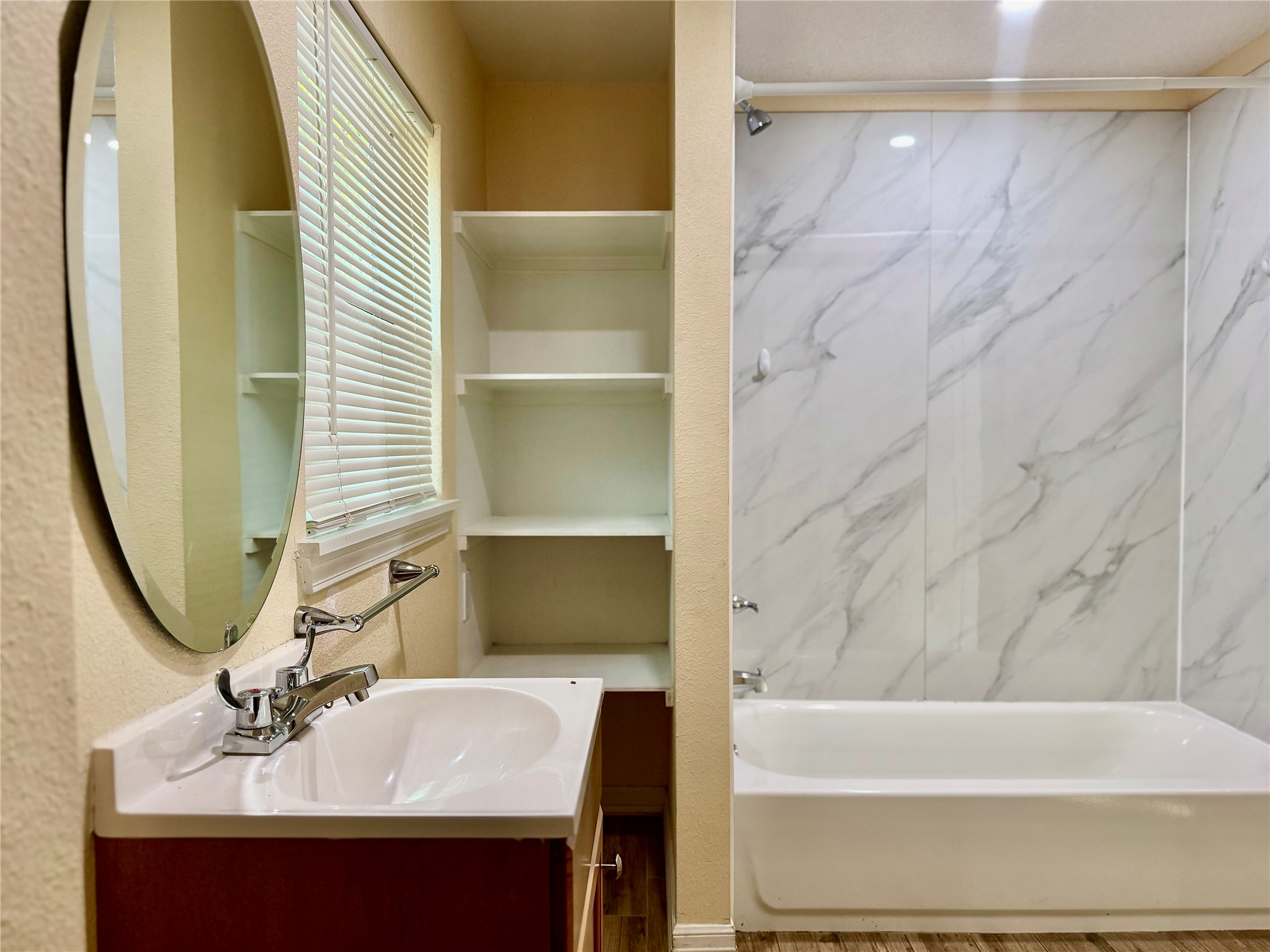 711 Hahlo Street, Unit STUDIO Houston, TX 77020 - Photo 9 of 10 a bathroom with a sink and a mirror