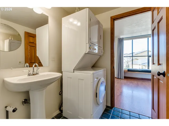a view of bathroom with dual sinks