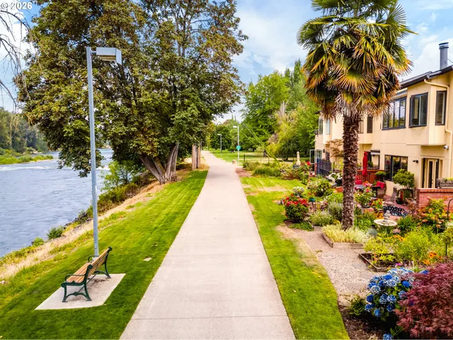 a view of swimming pool with a garden