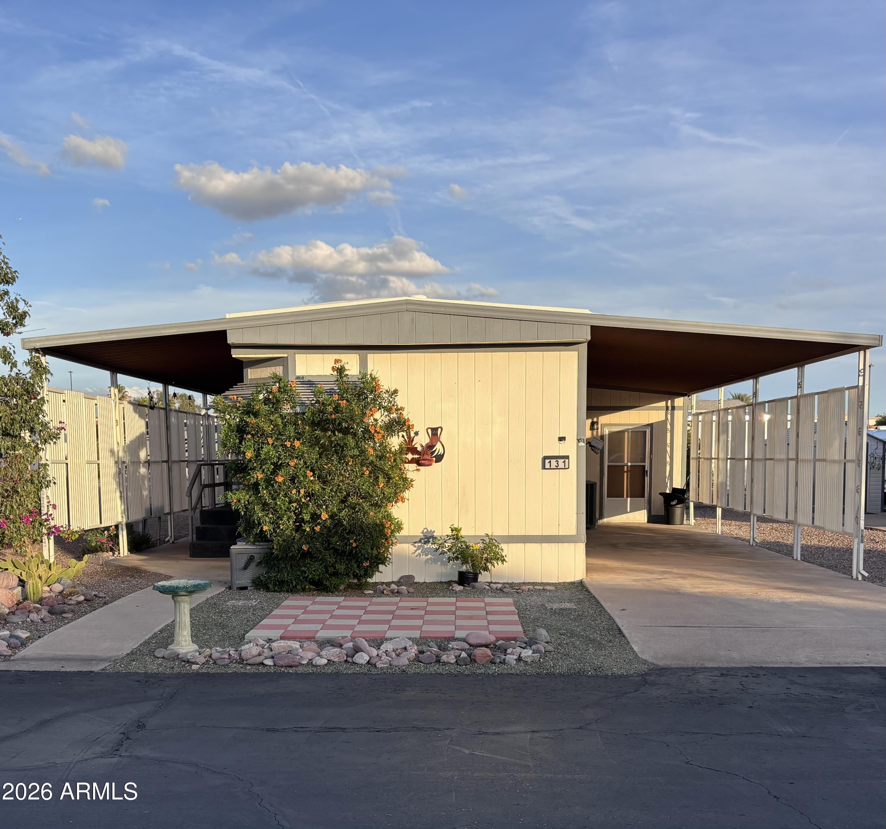 15802 South Gilbert Road, Unit 131 Chandler, AZ 85225 - Photo 1 of 30 a view of a parking area