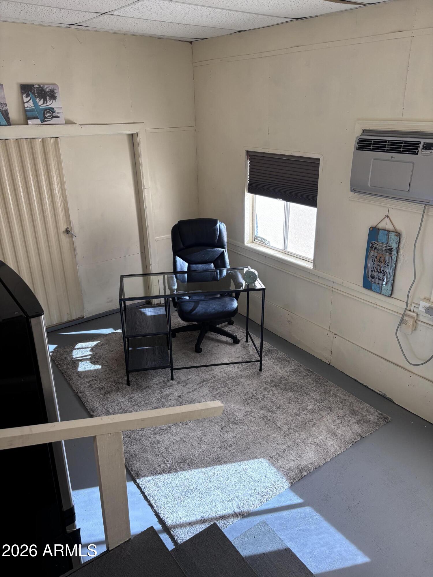 15802 South Gilbert Road, Unit 131 Chandler, AZ 85225 - Photo 18 of 30 a living room with furniture and a window