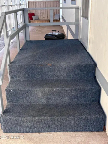 a view of entryway with a front door