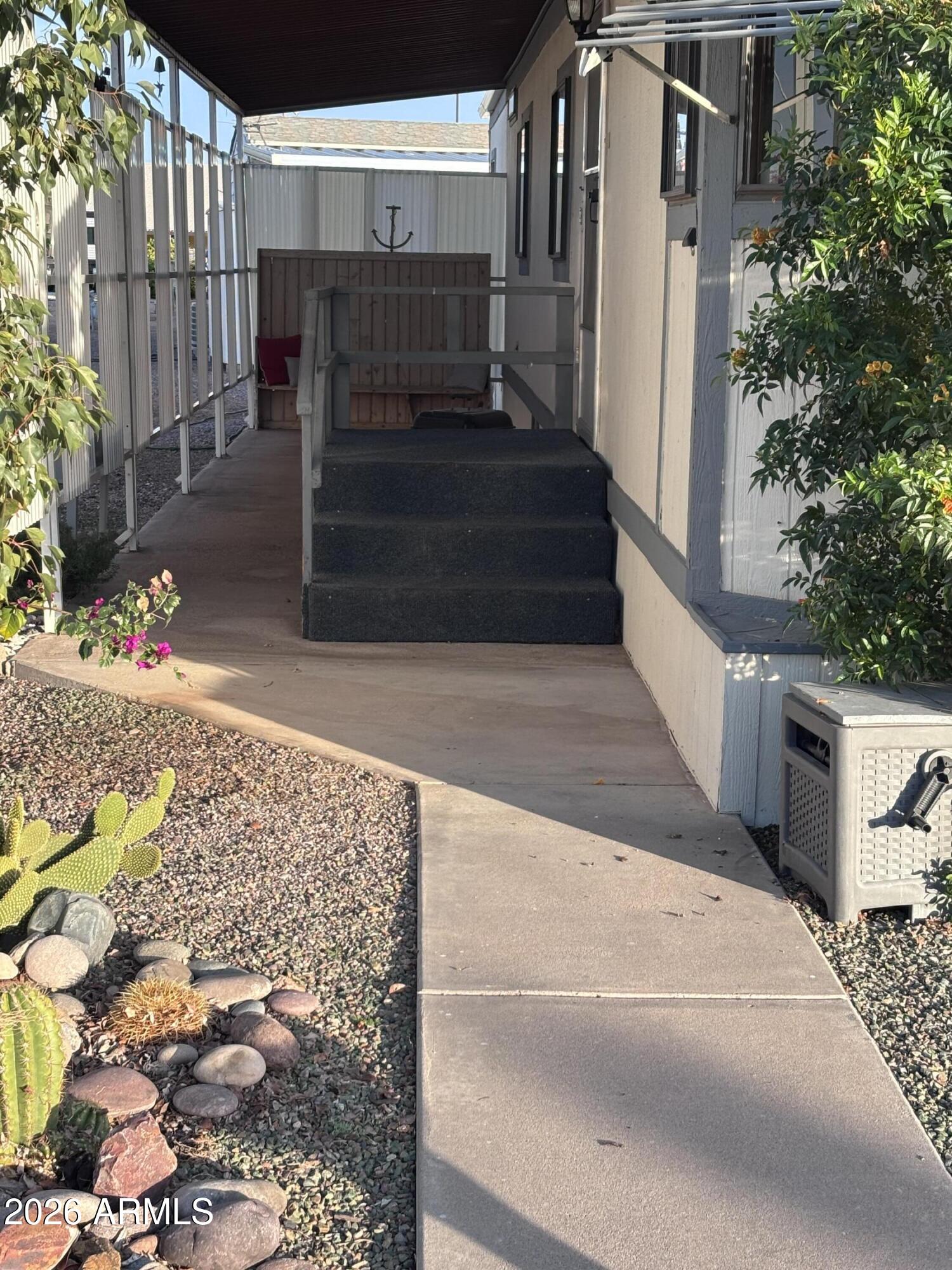 15802 South Gilbert Road, Unit 131 Chandler, AZ 85225 - Photo 21 of 30 a view of entryway with a front door