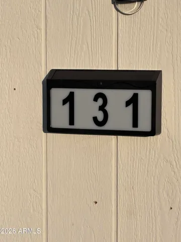 a view of a swimming pool with a chairs