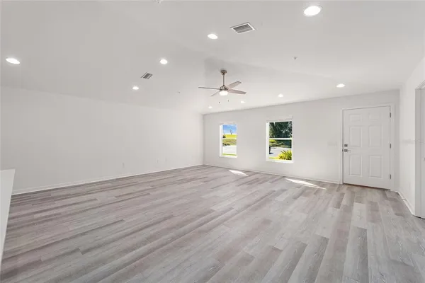 a view of kitchen with wooden floor