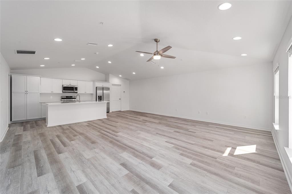 4417 Northwest 74th Terrace Ocala, FL 34482 - Photo 10 of 77 a view of a kitchen with a sink and a stove top oven