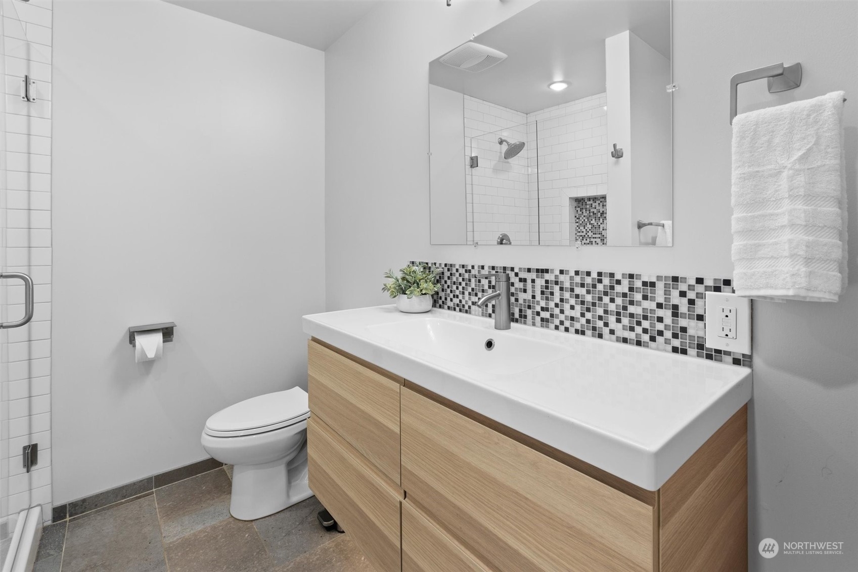 9631 Northeast 198th Street Bothell, WA 98011 - Photo 12 of 40 a bathroom with a sink a toilet and shower