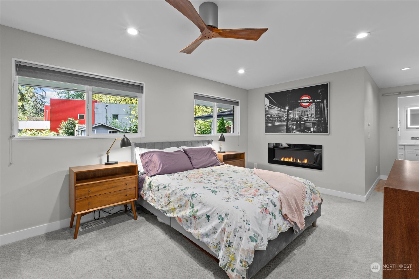 9631 Northeast 198th Street Bothell, WA 98011 - Photo 13 of 40 a bedroom with a bed and a couch