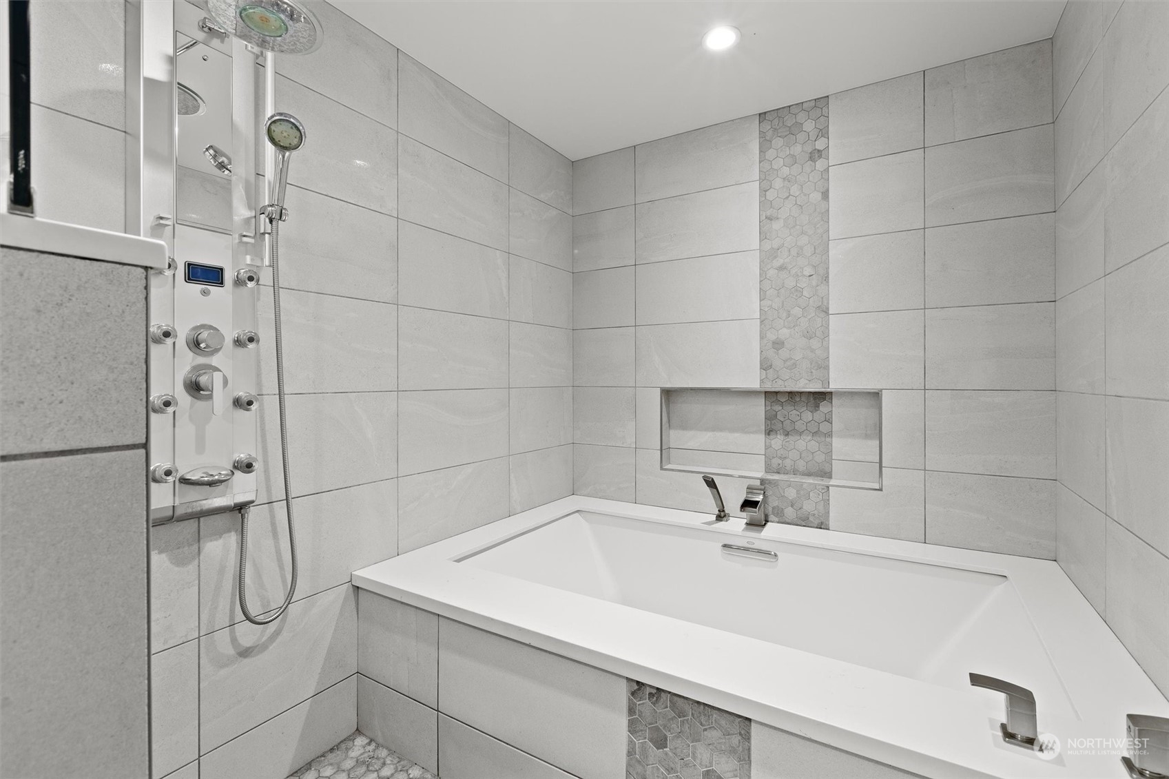 9631 Northeast 198th Street Bothell, WA 98011 - Photo 14 of 40 a bathroom with a sink and shower