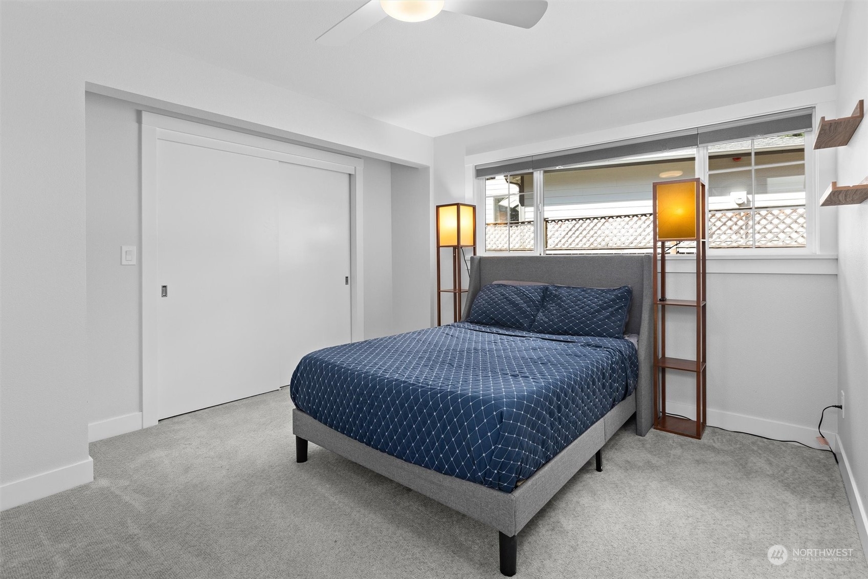 9631 Northeast 198th Street Bothell, WA 98011 - Photo 21 of 40 a bedroom with a bed and window