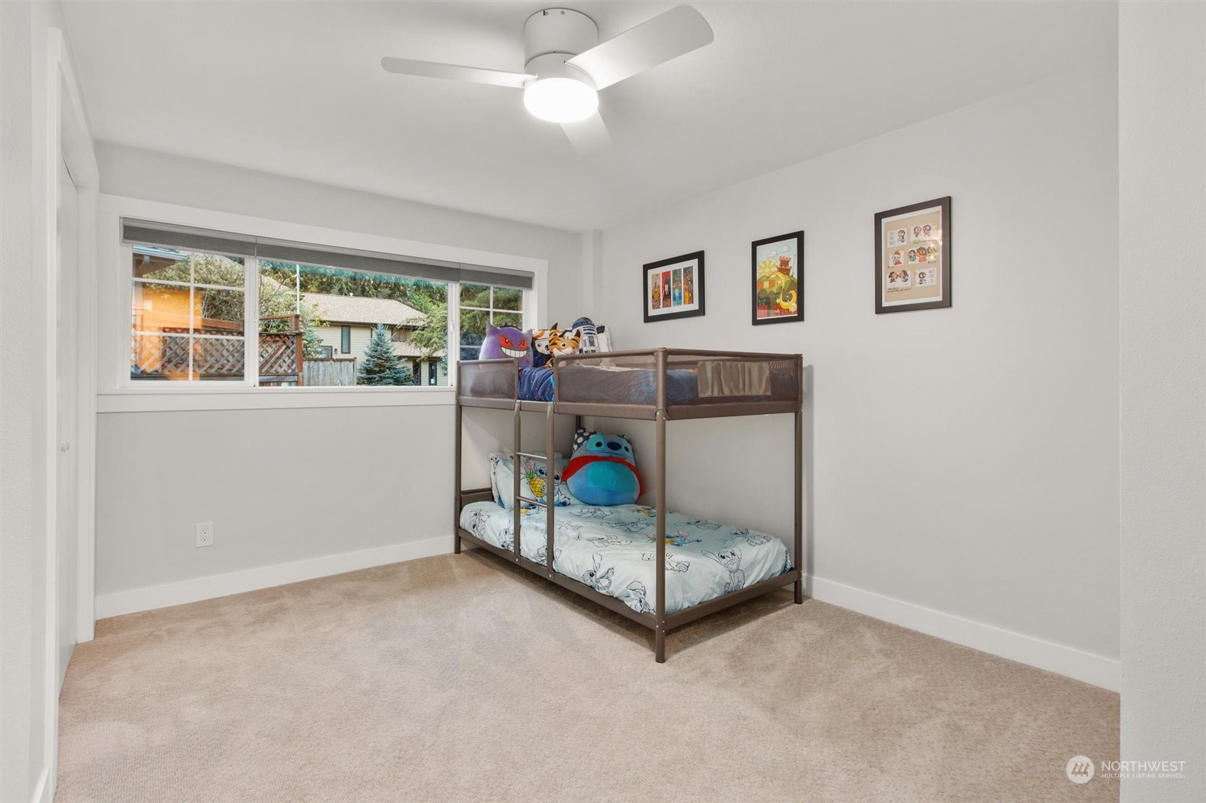 9631 Northeast 198th Street Bothell, WA 98011 - Photo 22 of 40 a view of an empty room with a window