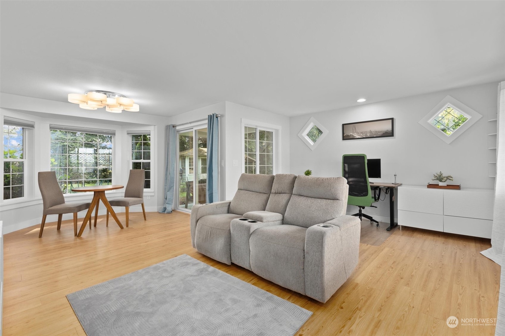 9631 Northeast 198th Street Bothell, WA 98011 - Photo 26 of 40 a living room with furniture and a wooden floor