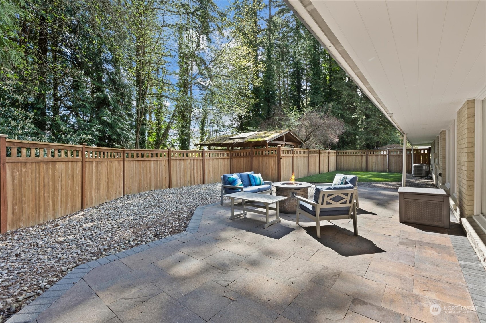 9631 Northeast 198th Street Bothell, WA 98011 - Photo 28 of 40 a view of backyard with large trees and wooden fence