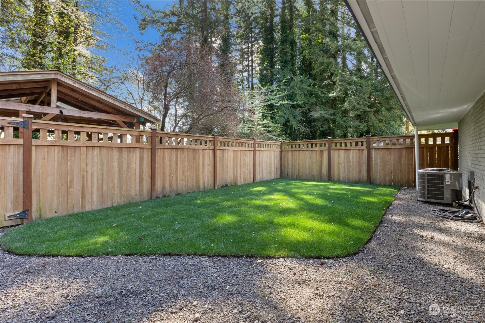 9631 Northeast 198th Street Bothell, WA 98011 - Photo 30 of 40 a view of a backyard with a garden and entertaining space