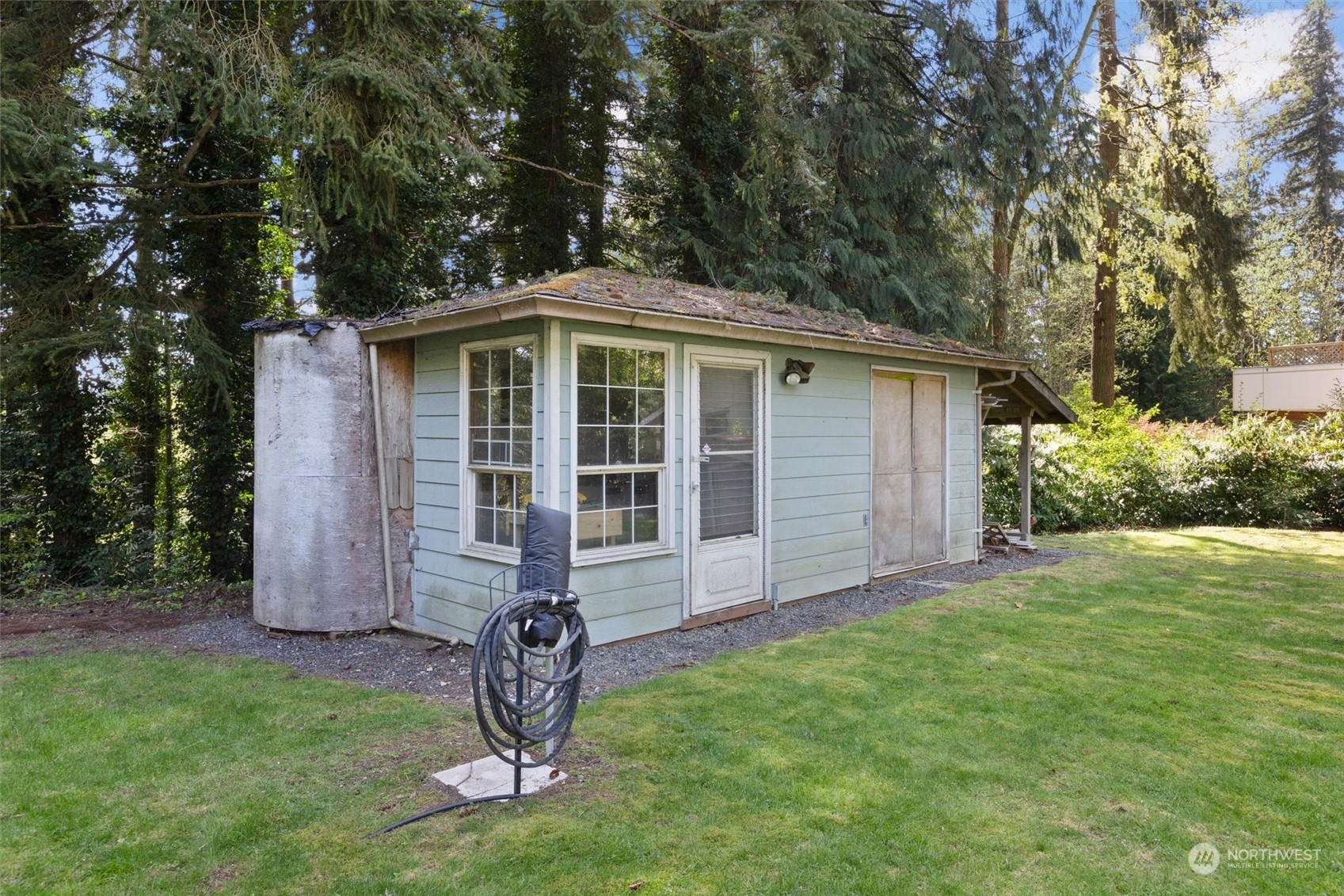 9631 Northeast 198th Street Bothell, WA 98011 - Photo 32 of 40 a front view of a house with garden