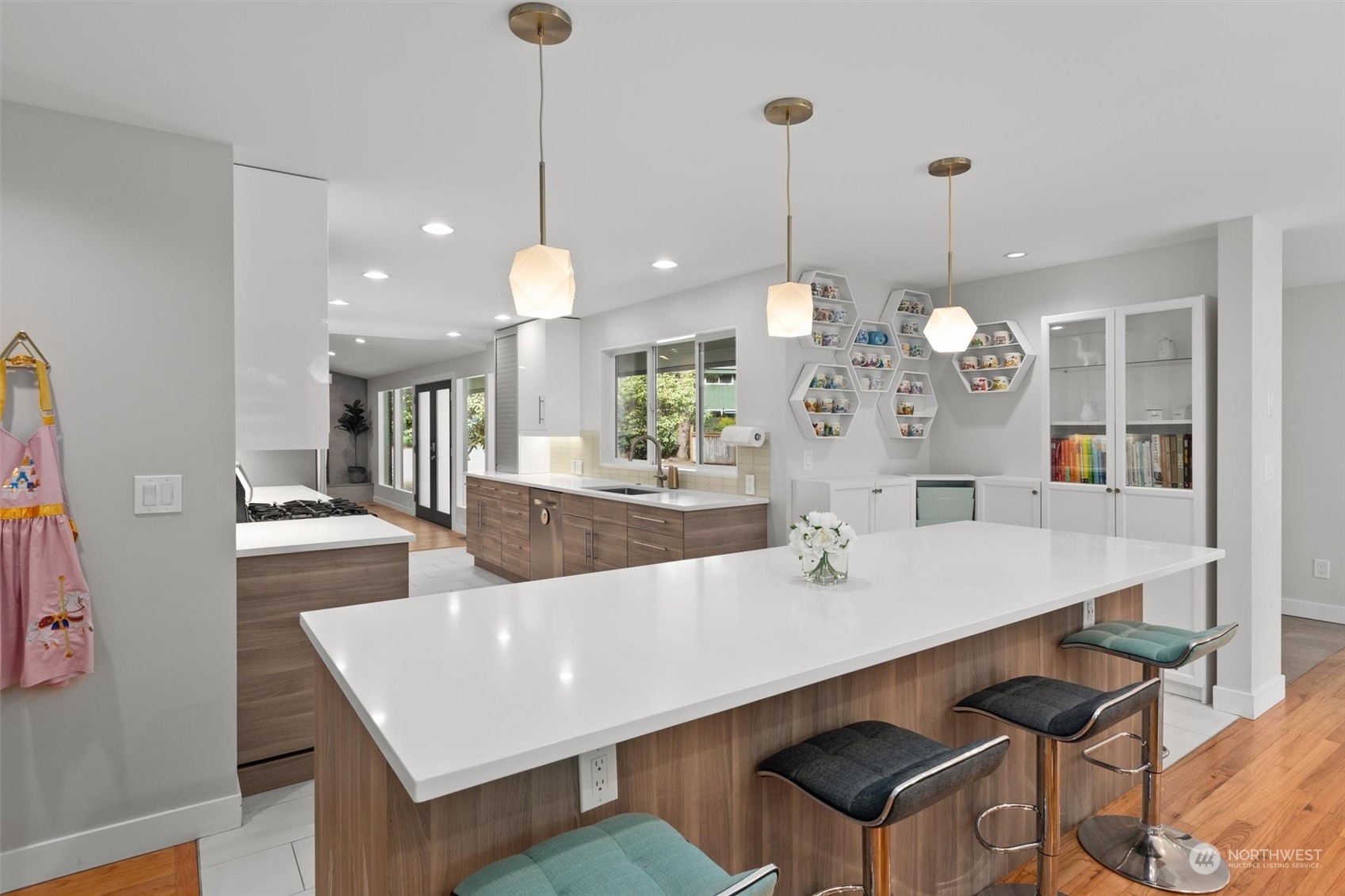 9631 Northeast 198th Street Bothell, WA 98011 - Photo 7 of 40 a large kitchen with kitchen island a table and chairs