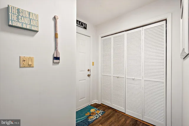 an aerial view of residential houses with city view