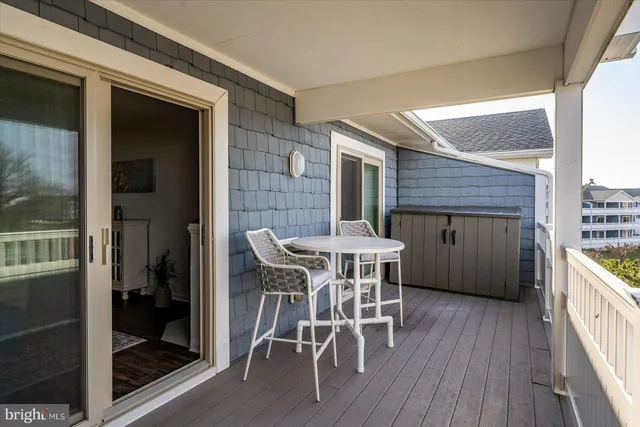 an aerial view of a house with a ocean view