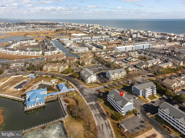 a view of a swimming pool and a yard