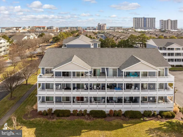 a view of swimming pool with outdoor seating
