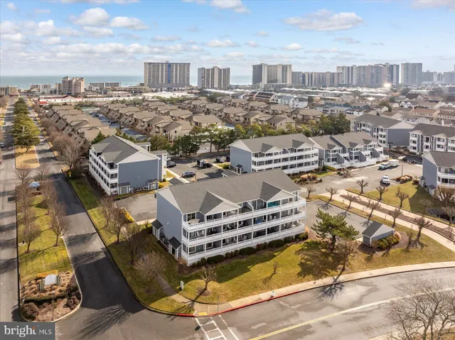 a view of a city with an ocean view