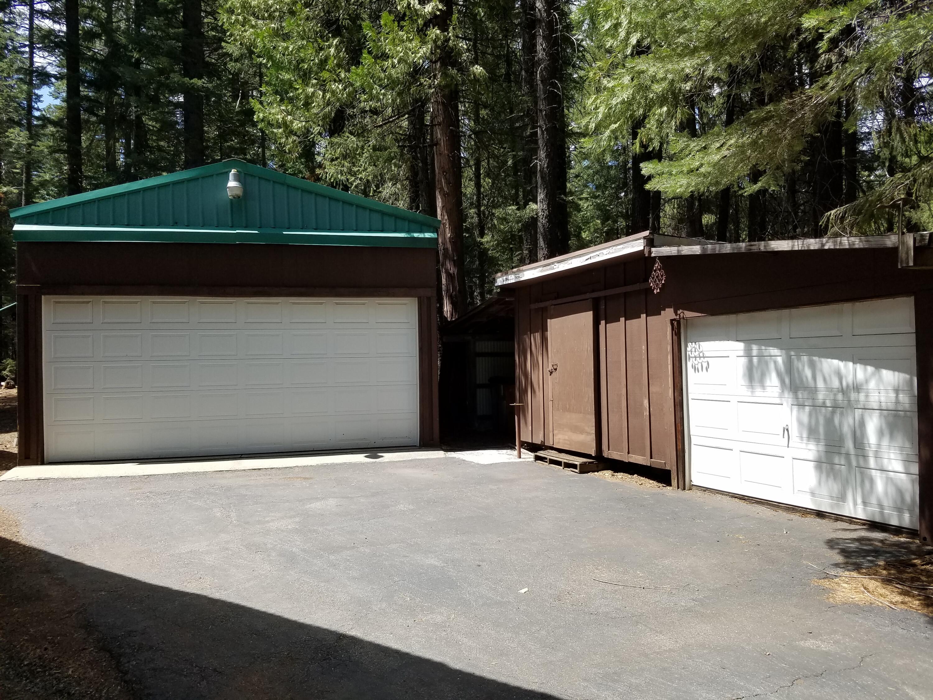 9340 Thatcher Mill Road Shingletown, CA 96088 - Photo 2 of 32 a front view of a house with a yard