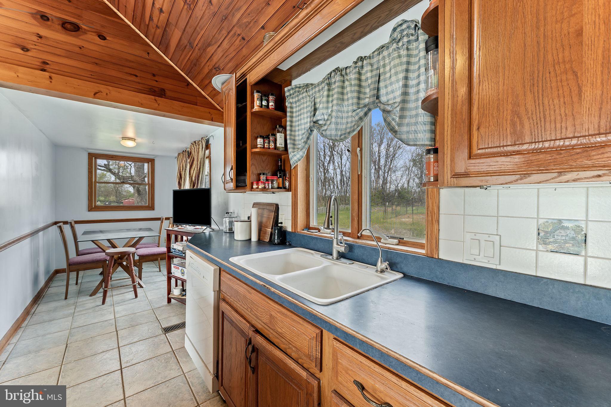 420 Russell Road Berryville, VA 22611 - Photo 32 of 60 Charming kitchen with rustic appeal.