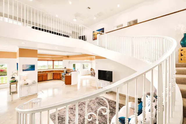 a living room with furniture and a gate