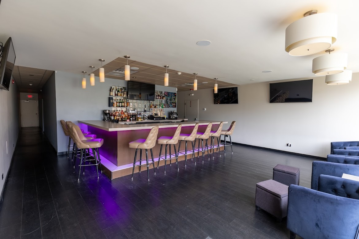 8905 Cermak Road North Riverside, IL 60546 - Photo 2 of 14 a living room with furniture and a flat screen tv
