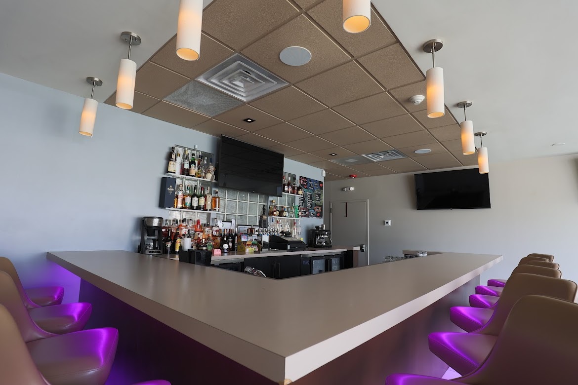 8905 Cermak Road North Riverside, IL 60546 - Photo 5 of 14 a living room with furniture and a flat screen tv