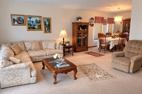 a living room with furniture and a couch