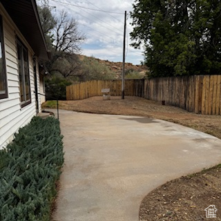 4709 East Independence Road Myton, UT 84052 - Photo 3 of 27 View of fenced backyard from gate or entrance to the front door
